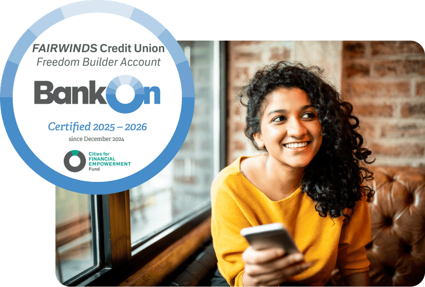 Young Indian woman using mobile phone at the bar.